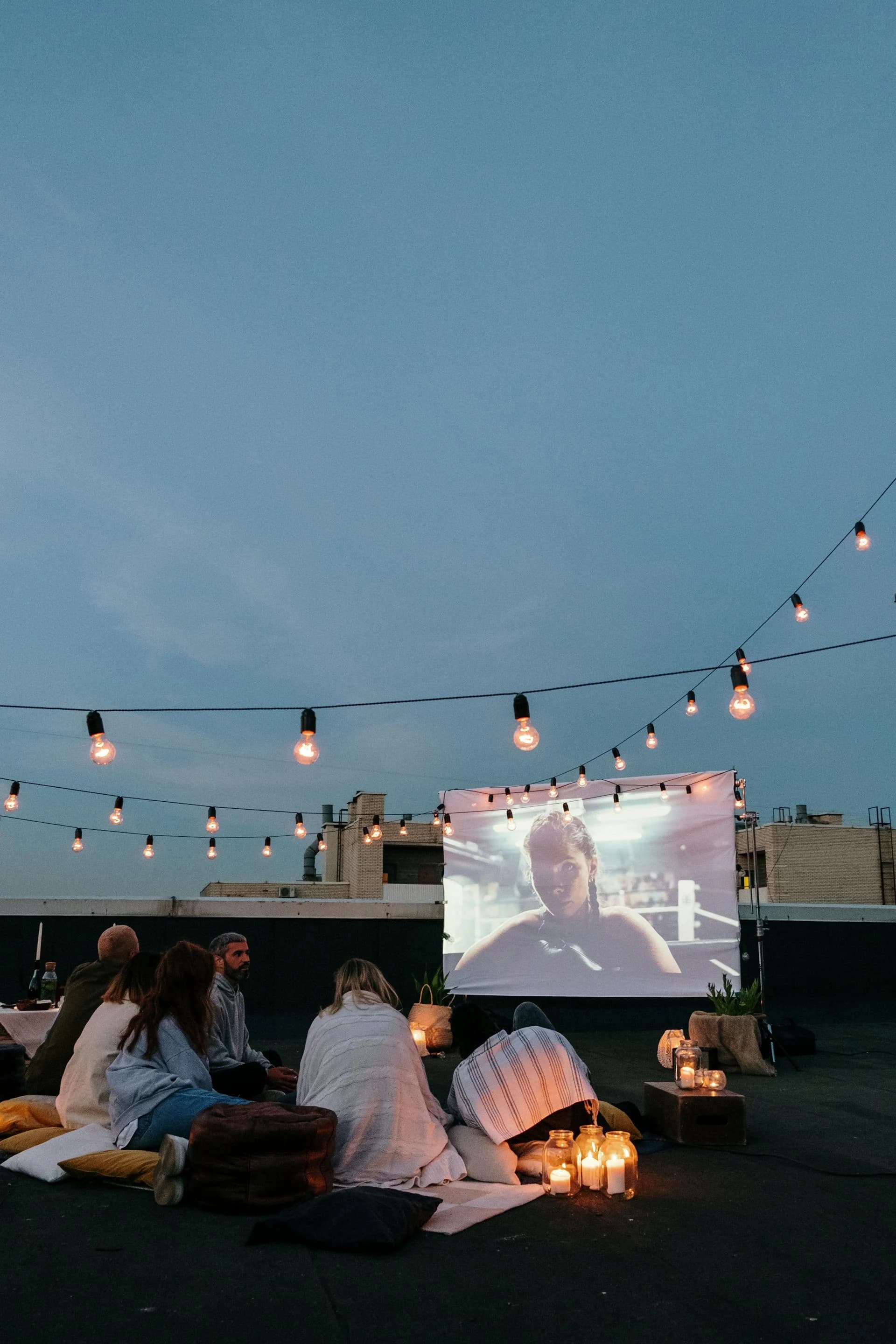 Friends at an outdoor rooftop movie night